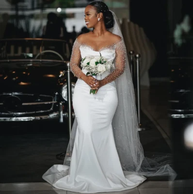 Vestido de novia africano de lujo perlas mangas largas blanco satinado vestidos de novia Foto 1 de 4