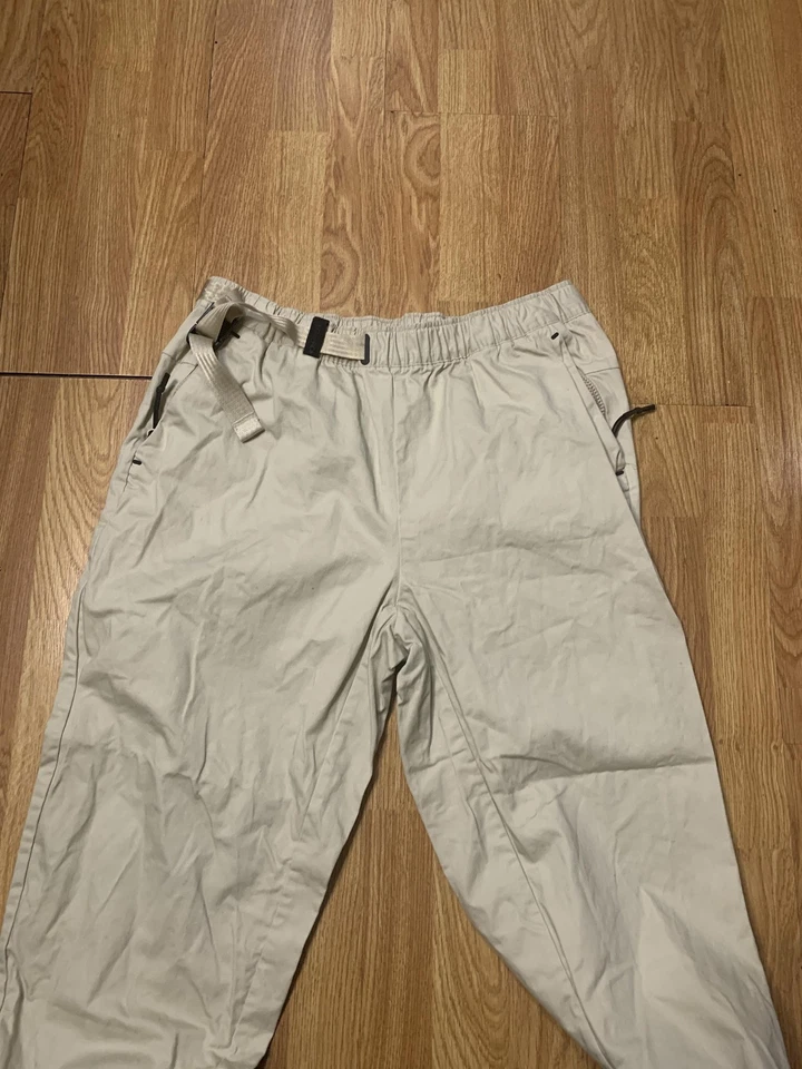Nike Tech Pack Pantalones Para Hombre Grandes Caqui Algodón Tejido Cinturón Cremallera Bolsillo Cónico Foto 1 de 4