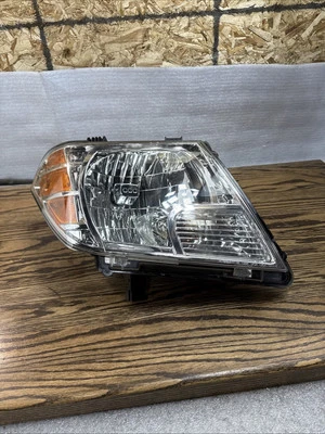 Reconditioned 2009-2021 Nissan Frontier Right Headlight Assembly 26010-ZL40B - Image 1 of 4