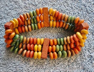 Bracciale 3 file perline legno 1" larghezza x 3 1/2" diametro; molto elastico e colorato - Foto 1 di 6