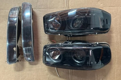 Luces de parachoques y faros de carcasa negra DNA Motoring con repuesto LED DRL Foto 1 de 3