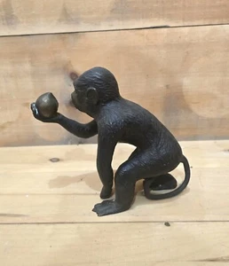 Bronze Monkey, Looking at a Stone or Something 9-1/2"L x 3-3/4"W x 7-1/2"H - Picture 1 of 7