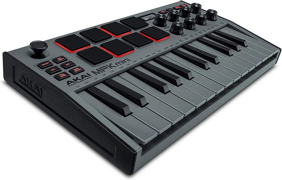AKAI MPK MINI MK3 GREY TASTIERA MIDI USB 25 TASTI CON DISPLAY PAD E KNOB GRIGIO - Immagine 1 di 1