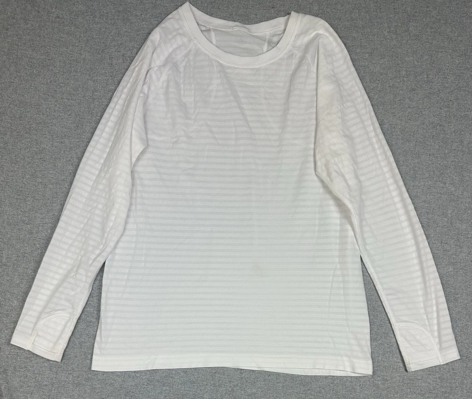 Top sin costuras Athleta Momentum XL manga larga blanco brillante rayas púrpura azul usado en excelente estado Foto 1 de 4