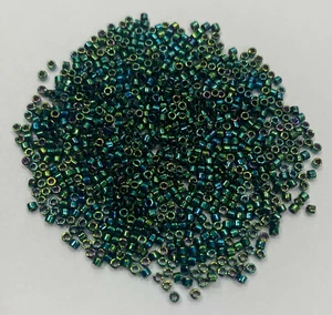 Qty 3 of 11/0 Package Miyuki Delica Lined Seed Beads - Metallic Iris Teal - Picture 1 of 2