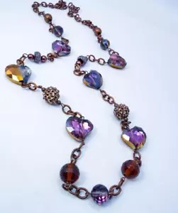 COLLANA CUORE CRISTALLO MULTICOLORE RAME "FIAMMA ETERNA" CYNTHIA LYNN - Foto 1 di 1