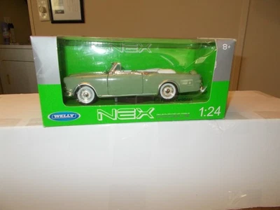 NUEVO WELLY NEX MODELOS 1953 PACKARD CARIBBEAN CONVERTIBLE ESCALA 1/24 Foto 1 de 4