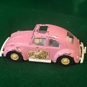 VTG Volkswagen Beetle TOOTSIE TOY "Stingin Bug" Die Cast Car Pink Chigago - Picture 1 of 9