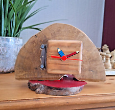 A hand crafted, original, recycled, apple tree log/disc clock