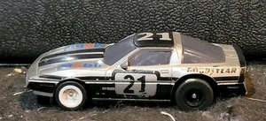 AFX Tomy Turbo HO Slot Car #21 Mobil Corvette Aurora testata funzionante - Foto 1 di 6