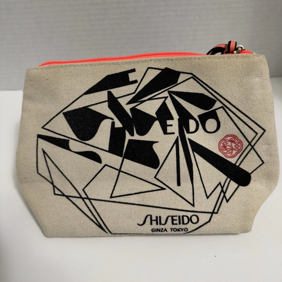 Shiseido Orange and White Canvas Cosmetic Makeup Bag Zipper Closure - Image 1 of 4