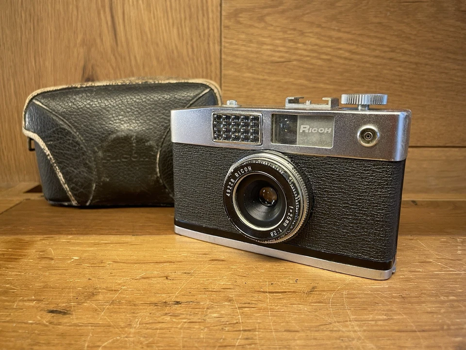 *Funcionamiento con medidor: lente TOMIOKA: excelente+5* Cámara fotográfica Ricoh Caddy de medio marco de JPN Foto 1 de 4
