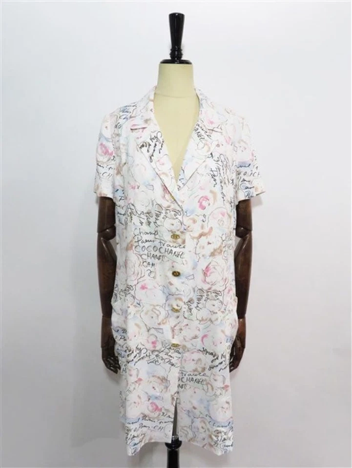 ABRIGO USADO 64278 CHANEL/CC LOGO CAMELIA MEDIA MANGA ACEPTABLE Foto 1 de 4