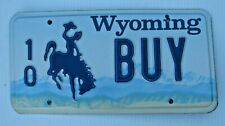 WYOMING GRAPHIC VANITY LICENSE PLATE " 10  BUY " NOW SELL REAL ESTATE