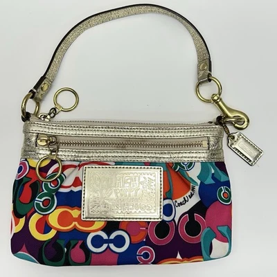 Cartera Muñequera Coach Poppy Graffiti Grande Estampado Pop C Foto 1 de 4