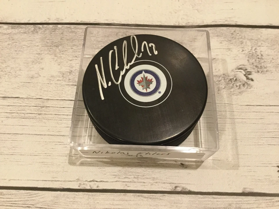 Disco de hockey autografiado por Nikolaj Ehlers Winnipeg Jets firmado c Foto 1 de 1