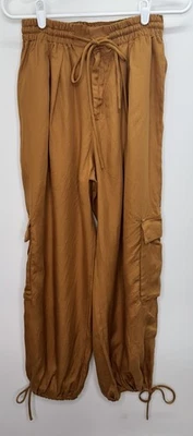 Pantalones cargo Free People nuevos con etiquetas Plash lisos varilla dorada boho para mujer XS pierna ancha tierra Foto 1 de 4