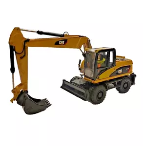 Excavadora de ruedas Caterpillar M316D modelo a escala 1:87 HO - Diecast Master 85177 - Imagen 1 de 5