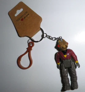 Dino Riders Llavero Mochila Clip Llavero Hecho a Mano Sting Evil Rulon De Colección - Imagen 1 de 3