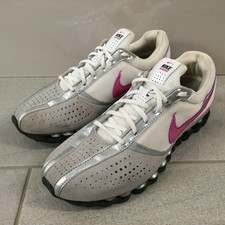 nike shock absorber trainers