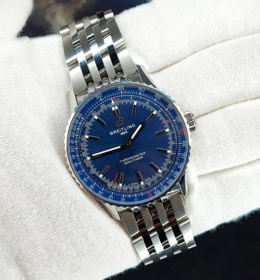 Reloj y caja Breitling Navitimer esfera azul A17329 SS cronógrafo 41 mm SIN USAR Foto 1 de 4