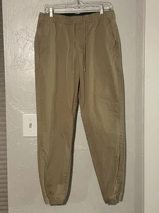Pantalones de chándal chinos caqui medianos para hombre Abercrombie & Fitch elásticos de viaje cónicos - Imagen 1 de 4