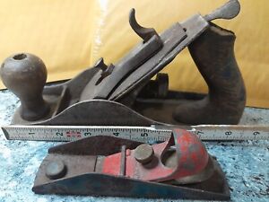 Lot 2 Hand Planes 1 Stanley 1 Unbranded 9"6" Red Blue On Small One Rusty Gold