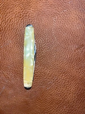 Navaja de bolsillo Camillus número 42 oro blanco plata. usado. afilado. daños menores Foto 1 de 4