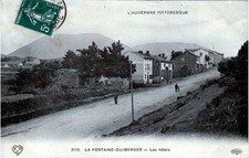 63 CPA  ANIMEE 1912 -LA FONTAINE DU BERGER -LES HÔTELS