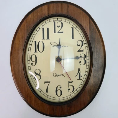 "Reloj de pared vintage de cuarzo Ingraham de 10,8"" vidrio abovedado ovalado madera oscura hecho en EE. UU. Foto 1 de 4