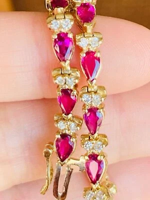 14kt yellow gold genuine Ruby and diamond tennis bracelet - Image 1 of 4