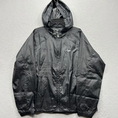 Chaqueta impermeable ligera con capucha negra talla grande Sierra Designs para mujer Foto 1 de 4