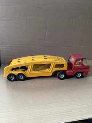 Vintage ERTL Structo Pressed Steel Car Carrier Red Cab Yellow Trailer - Image 1 of 4
