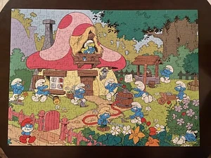 Puzzle 2017 limpieza de primavera de los Pitufos en la Casa de la Pitufa ~ RARO~ Pitufo - Imagen 1 de 7
