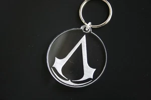 Laser Engraved Acrylic Keyring Assassin's Creed Logo - Picture 1 of 4