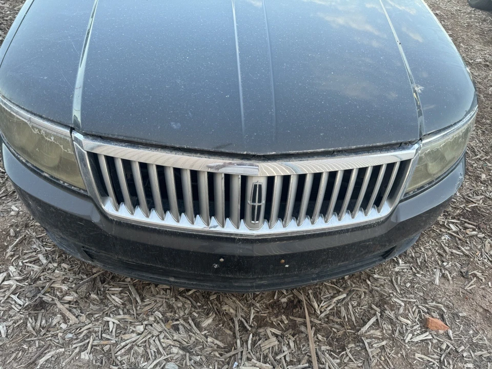 For Lincoln Zephyr 2006 Bumper Cover Front Black  OEM - Image 1 of 3