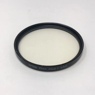 Tiffen 77mm HAZE-1 filter , UV  U.S.A. - Image 1 of 3