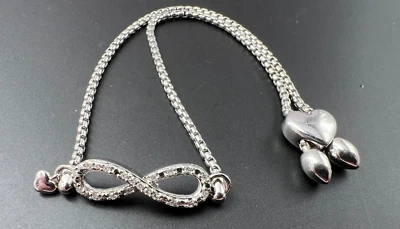 STERLING SILVER 925 1/20TCW ROUND CUT WHITE DIAMOND ADJUSTABLE INIFNITY BRACELET - Image 1 of 4