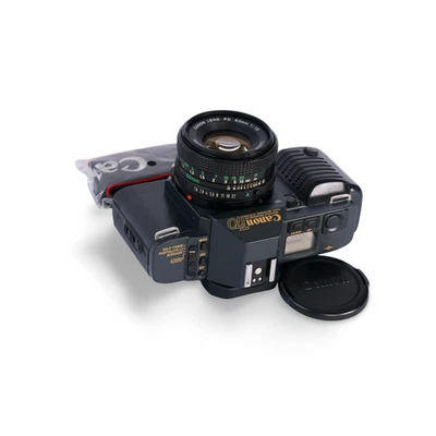 Canon T70 35 mm pellicola reflex motorizzata c/w NFD 50 mm f/1.8 kit obiettivo standard e cinghie - Immagine 1 di 4