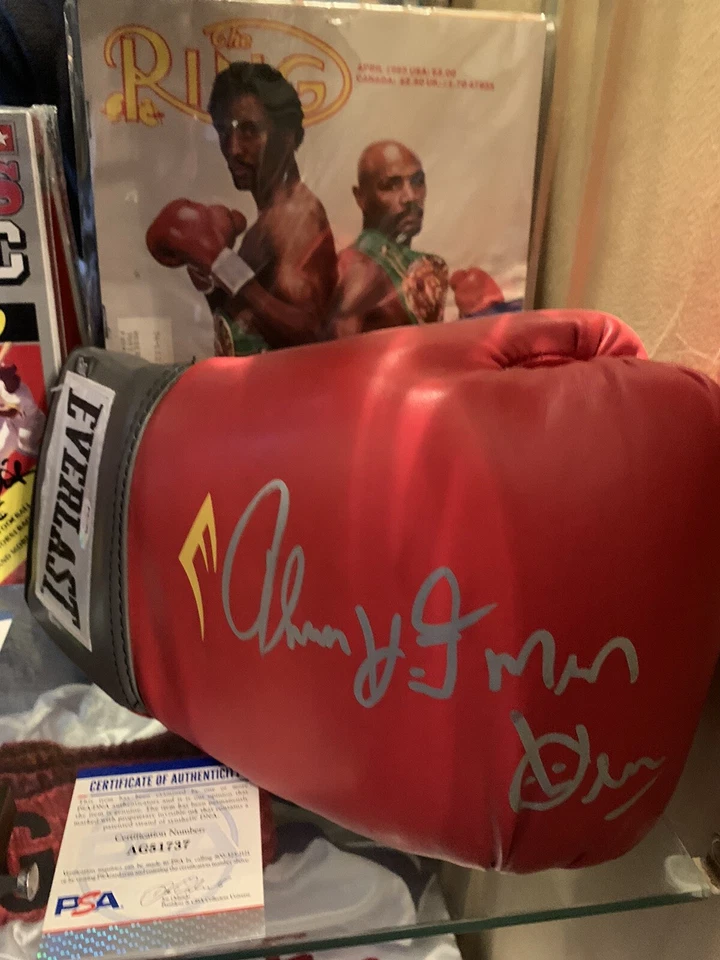 vintage thomas “the hitman” hearns autographed boxing glove with PSA and magazin - Image 1 of 4