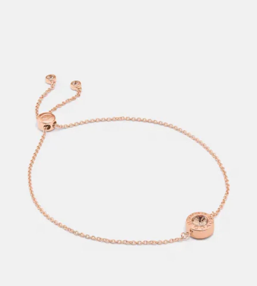 Pulsera deslizante círculo abierto Coach F67072 oro rosa nuevo con etiquetas precio de venta sugerido por el fabricante 78 USD Foto 1 de 1