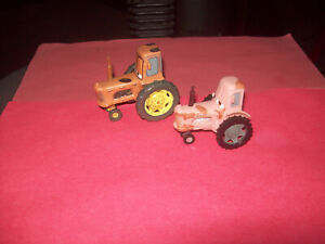 LOT OF TWO DIFF. EARLY DISNEY PIXAR HOLSTEIN HEIFER CHEWALL TRACTORS