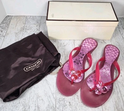 Sandalias Coach Madlena Mujer 9.5 Rosa Gelatina Pom Balls Tanga Chanclas Logo Foto 1 de 4