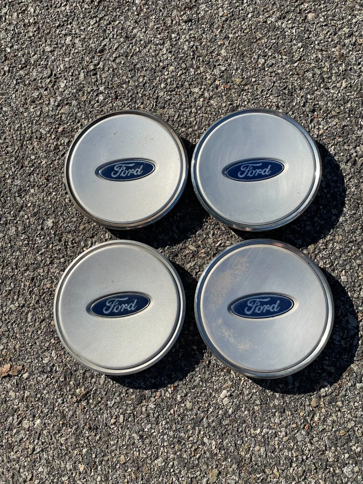 Tapacubos centrales de llantas de aleación Ford Windstar 2001 a 2003 de fábrica Foto 1 de 4