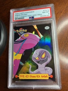 1999 Topps Pokemon TV #TV12 Ekans/Arbok Rainbow Foil Smooth PSA 8 NM-MT - Bild 1 von 2