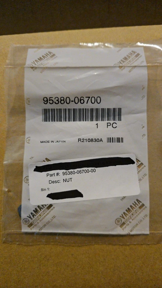 Yamaha 95380-06700 Nut Genuine OEM New - Image 1 of 1