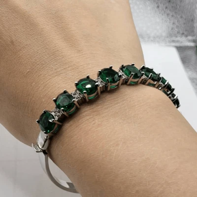 Elegante Pulsera Bisagras Esmeralda y Cristal Blanco - Grande Foto 1 de 4