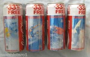 #YY9. SURFING COCA COLA COKE LARGE CAN SET OF FOUR, BOTTOM OPENED - Picture 1 of 4