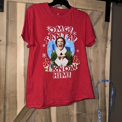 Elf Boys Size Large Red Tshirt With “omg! Santa! I Know Him” & Graphic Of Buddy - Image 1 of 3