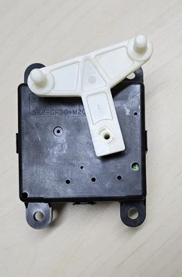 Infiniti / Nissan OEM 27730-JK61A HVAC Air Intake Actuator (Used, G37) - Image 1 of 4